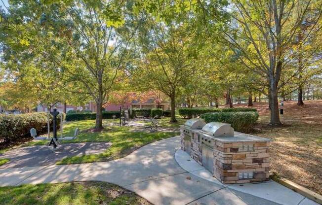 Amenity area with double grilling station and outdoor fitness center