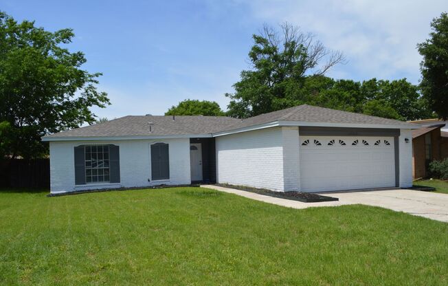 Beautifully remodeled 3 bed 1.5 bath in the desirable subdivision of Woodstone