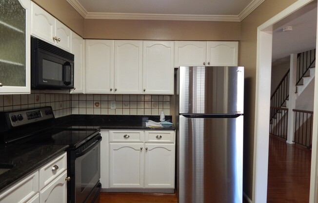 Fabulous TH with Garage! Great Location!