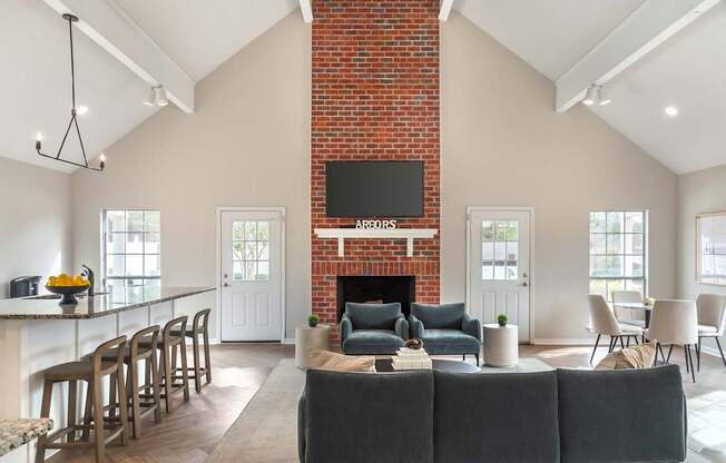 A living room with a fireplace and a couch.