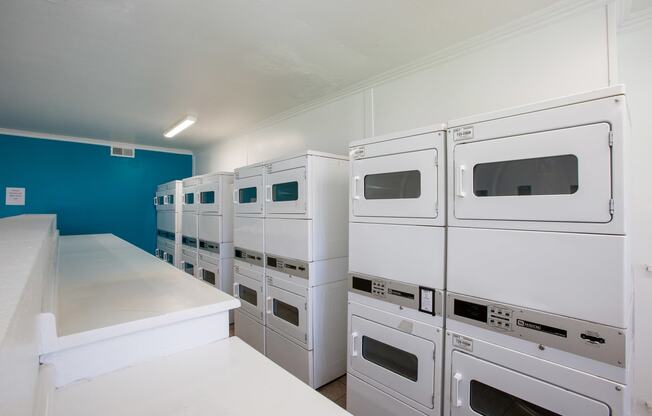 Laundry Center at Whispering Sands Apartments in Albuquerque