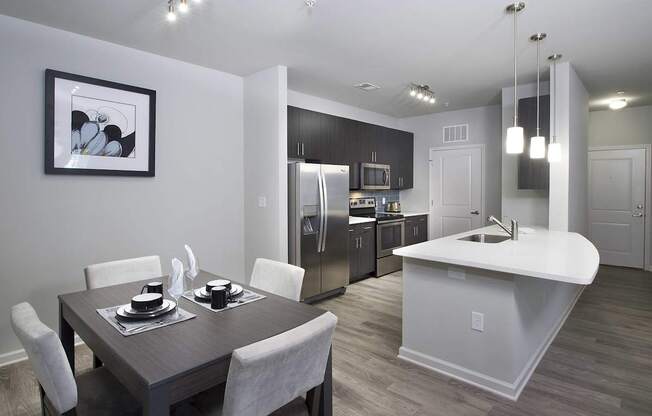 Phase II suites feature quartz countertops, stainless appliance package and contemporary gray finish 42" cabinetry