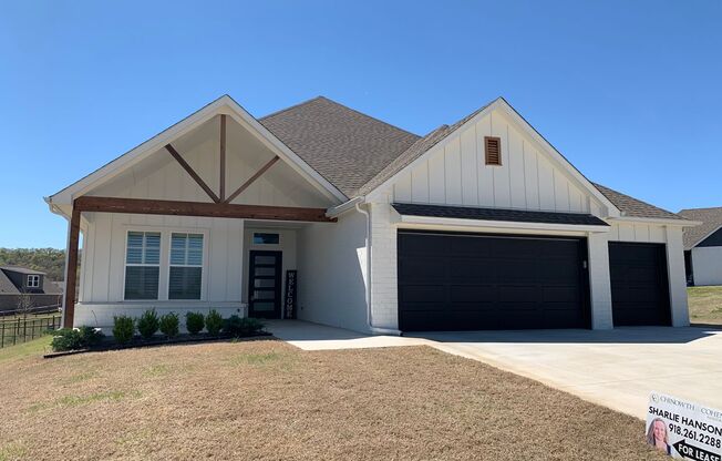 Beautiful home tucked in the rolling wooded hills of Catoosa