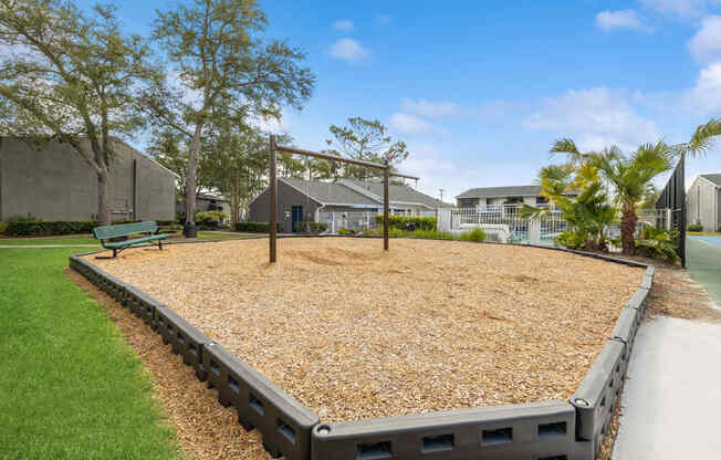 Community swing set with bench