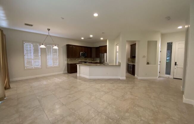 BEAUTIFUL SINGLE STORY 3 BEDROOM 3 BATH HOME IN ANTHEM COUNTRY CLUB COMMUNITY INCLUDES 2 CAR GARAGE WITH STORAGE!