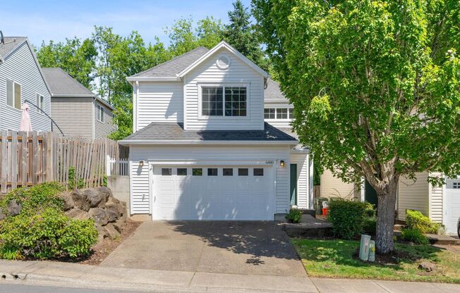 Spacious 3-bdrm/2.5-bath Bethany home w/ a cozy vibe—Private back yard, A/C, 2-car garage, fab location