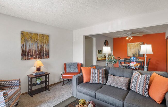 a living room with a couch and a table