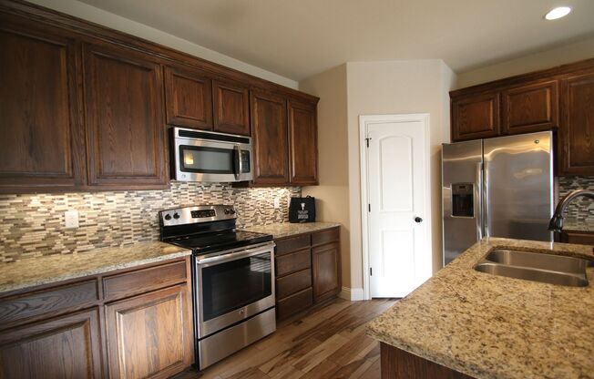 YOUR Dream Home is HERE! ~3 Bedroom 2.5 Bath ~ Full Size Washer/Dryer Connections Upstairs ~ Stainless Steel Kitchen Appliances ~ Custom Wood Cabinets ~ Ready for ASAP Move in!!! ~