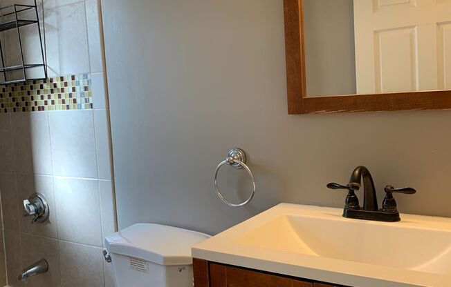 Heat and hot water included! Bright and clean 2 bed 1 bath 1st floor condo in a well managed building