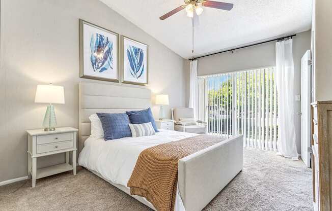 a bedroom with a bed and a ceiling fan at Waterford Park Apartment Homes, LLC, Lauderhill, FL 33319