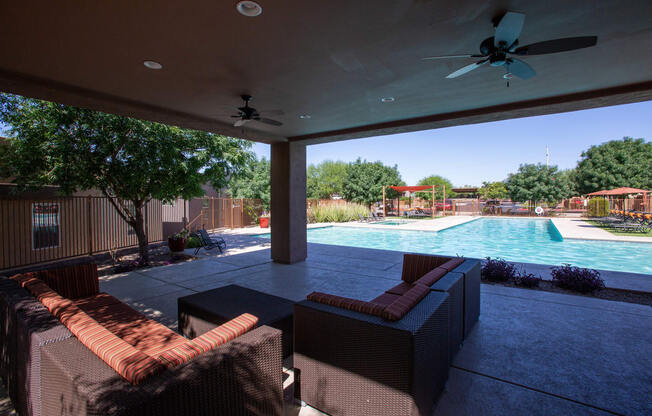 Pool lounge area at Sabino Vista Apartments in Tucson