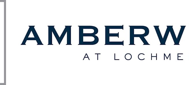 A logo with the text "AMBERWOOD AT LOCHMERE" in front of it.