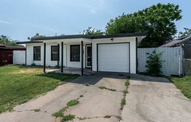 CENTRAL CITY FOUR BEDROOM TWO BATH HOUSE!
