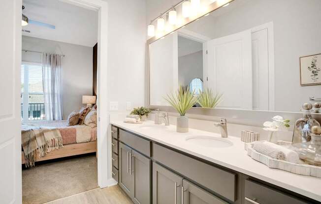 A Bathroom With a White Door at The Aster Apartments, North Carolina, 27519