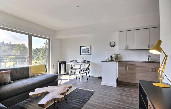 The Merc Apartments Model Living Room and Patio Door