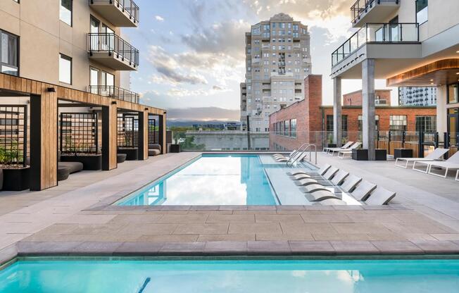 Escape the city buzz and dive into pure relaxation at Modera Golden Triangle's resort-style pool and as the day cools, melt away stress in the hot tub.