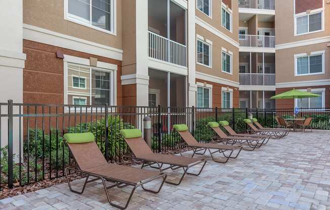 Poolside Lounges at Riversong Apartments in Bradenton, FL
