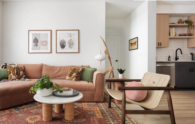 Open-concept living with warm wood finishes, stainless steel appliances, and a seamless flow from kitchen to lounge—designed for everyday ease.