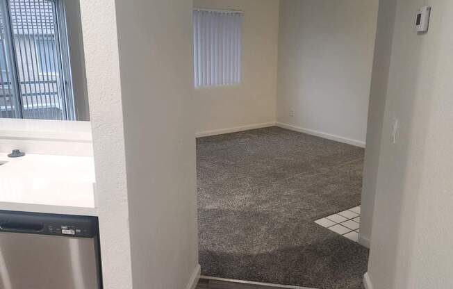 A room with a washer and dryer in it.