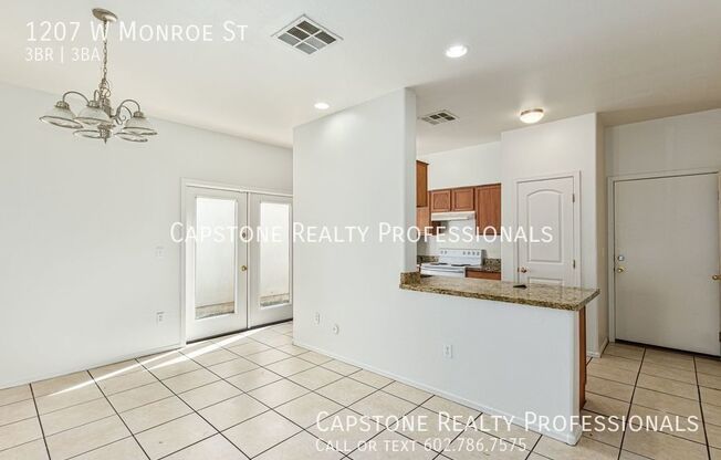 1207 W MONROE ST