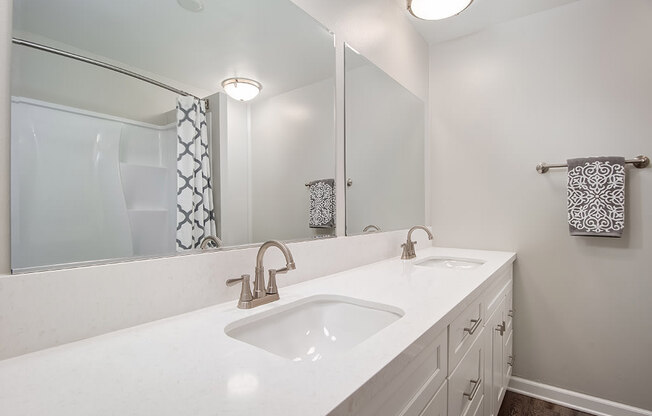 Bathroom with vanity sink at Parc at 5 Apartments, Downey, California