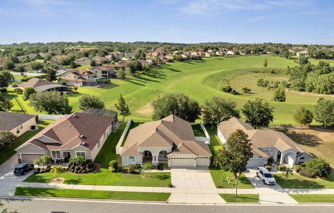Stunning 4/3 with Fence Enclosed Yard in the Overlook at Lake Louisa in Clermont!