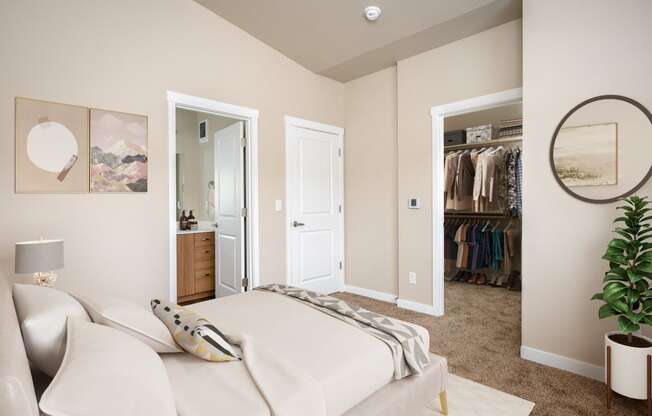 a bedroom with a white bed and a closet