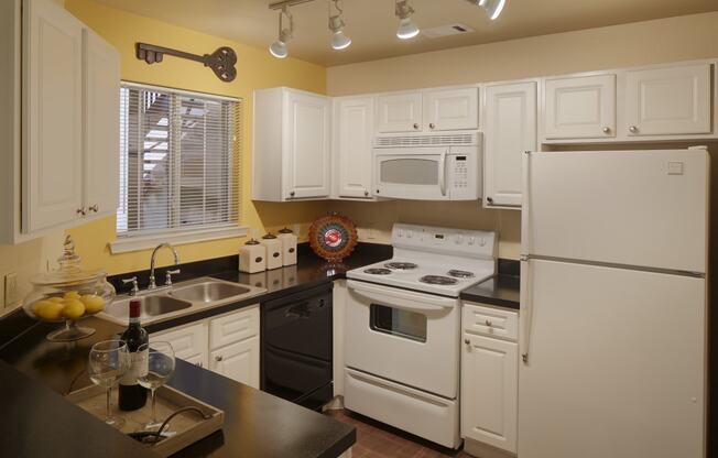 Apartment kitchen with built-in microwave | Austin TX