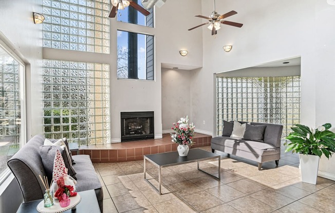 Living room with couches and a fireplace  at Wellington Farms, Charlotte, NC, 28212