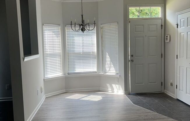 Ready for Now! Located in Raleigh. 3 Story End unit Townhome