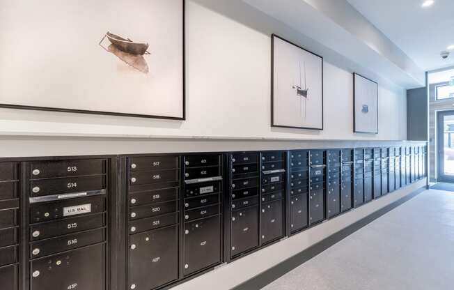 a row of mailbox lockers in a hallway at Marina Square, Washington