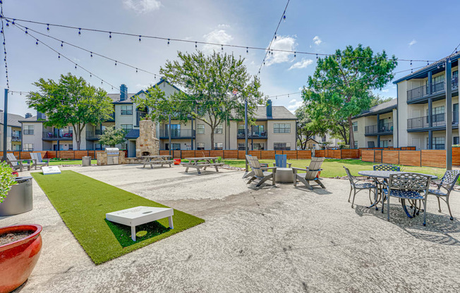 the reserve at bucklin hill leasing office courtyard with tables and chairs