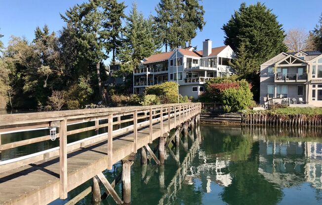 Boutique in town condo building with luxury top floor waterfront unit....now available