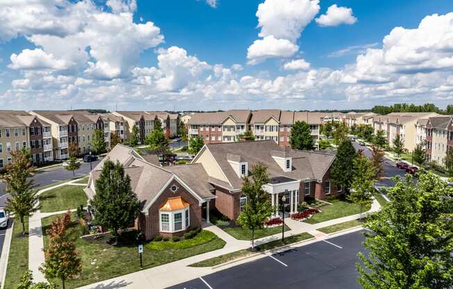 an aerial view of a community with houses and trees