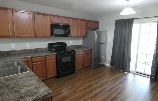 Two Bedroom Two and Half Bathroom End Unit located in The Gables