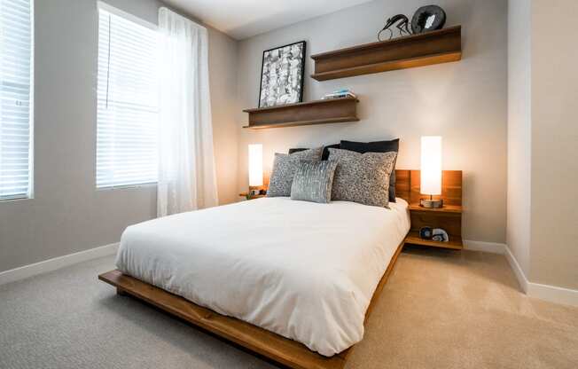 Santa Clara CA Luxury Apartments-Spacious Bedroom With Cozy Carpets, Modern Features, and Large Windows for Natural Light In The Apartment