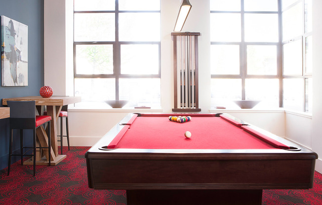 Socialize with friends in our billiards and game room