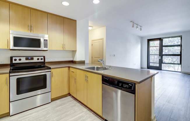 unfurnished kitchen with stainless steel appliances