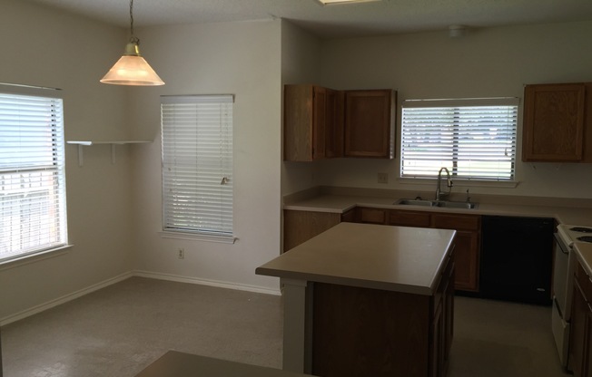 NICE 3 BEDROOM LOCATED ON A LARGE CORNER LOT*COUNTRY KITCHEN WITH ISLAND*LARGE MASTER BR DOWN W/ OUTSIDE ACCESS*FIREPLACE IN LIVING*EASY ACCESS TO RANDOLPH AFB, FT. SAM, & SHOPPING