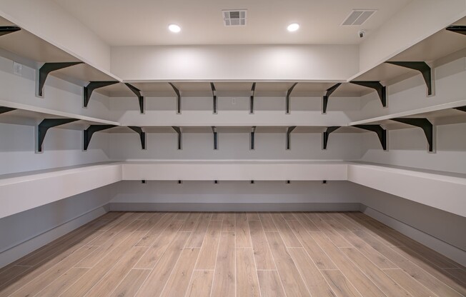 Elevate your storage game with this spacious, beautifully designed pantry at Sage at Celina Residences. Ample shelving provides flexibility and organization for all your culinary needs. Don't miss out—schedule a tour today!