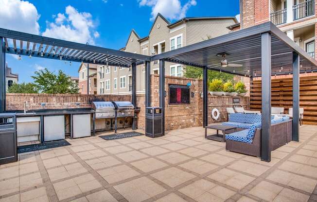 Resort style pool with lounge seating and grilling area