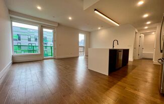 Stunning 2-Bed/2-Bath Condo with One-Car Garage and Rooftop Deck! Available NOW!