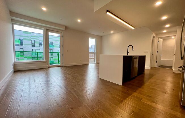 Stunning 2-Bed/2-Bath Condo with One-Car Garage and Rooftop Deck! Available NOW!