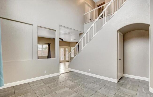 Beautifully upgraded kitchen and tile flooring in 2 story home.
