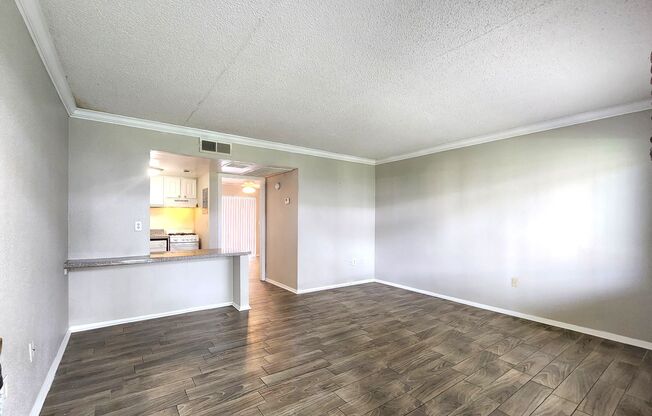 Ground Floor End-Unit; New Paint; All-Tile Flooring; Pool; Water/Sewer INCLUDED in the Rent!