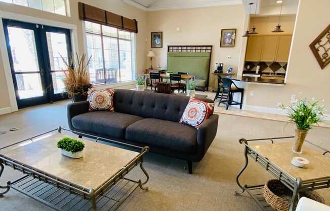 a living room with a couch and a table