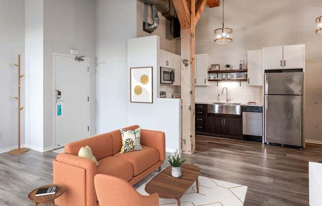 A living room with a couch and a coffee table.