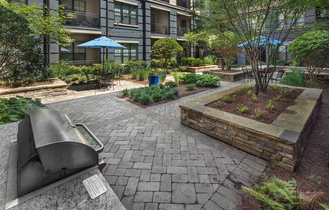 Serene Courtyard with Grills and Fire Pit