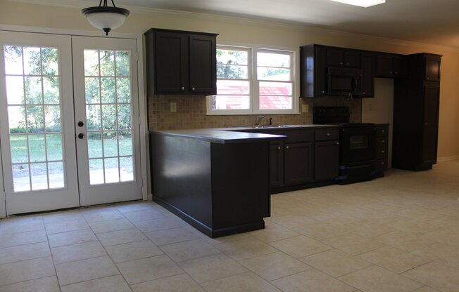Lovely 3 Bedroom Home with Large Fenced in Yard!