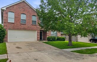 Wonderful two story with a huge yard!